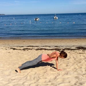 Plank with shoulder lift