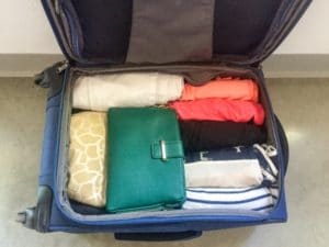 How to pack suitcase light