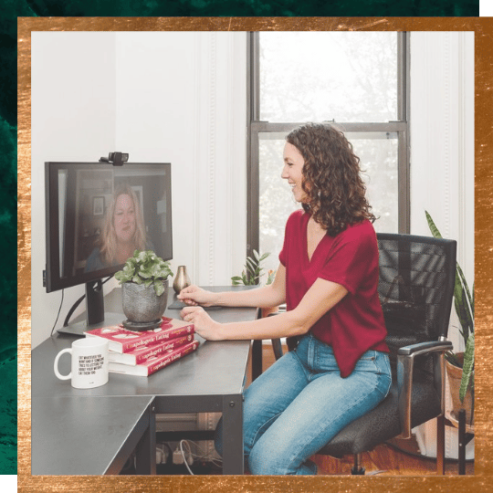 virtual intuitive eating coaching dietitian - image of Alissa sitting in front a computer talking with a blond woman on the computer screen